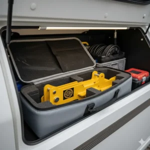 A Sold Secure Gold wheel clamp stored neatly in its carry bag inside a Bailey caravan front locker.