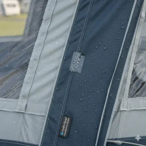 Close-up of waterproof fabric and taped seams on a lightweight awning for UK rain protection.