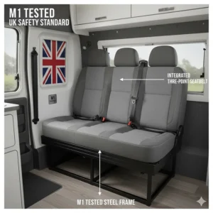 A crash-tested M1 pull-out seat with integrated three-point seatbelts, meeting UK safety standards for passenger travel.
