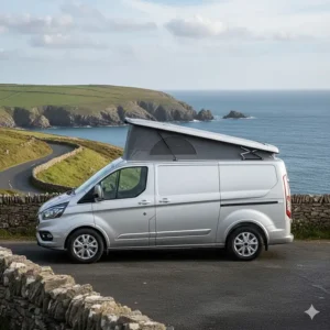 Side view of a Short Wheelbase Transit Custom showing the sleek, low-profile fit of a closed elevating roof.