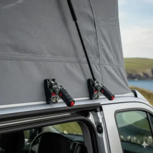 Detailed view of the secure twin-point locking system for an elevating pop top roof on a SWB Ford Transit.
