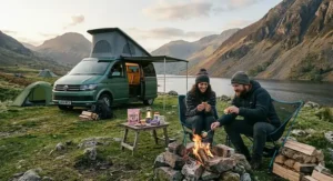 A person enjoying a cup of fresh pour-over coffee while wrapped in a blanket at a campsite in the Peak District.