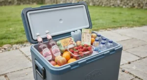 The spacious 50L interior of the cool box filled with food and drinks for a family day out.
