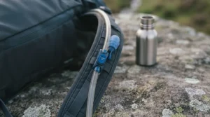 Osprey hydration pack bite valve secured to the shoulder strap via a handy magnetic clip for easy access on the go.