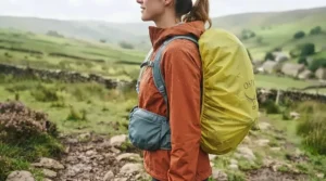 A water-resistant hydration pack enduring a light drizzle on a typical UK walking path.