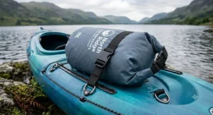 Graphic illustration showing a sleeping bag, spare garments, and electronics safely stored inside separate dry sacks.