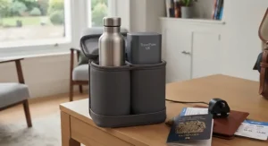 A USB-rechargeable UV purifier for international travel plugged into a power bank inside a modern daypack.